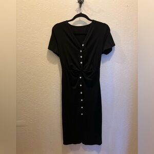 Black cotton dress with white buttons and knotted waist detail